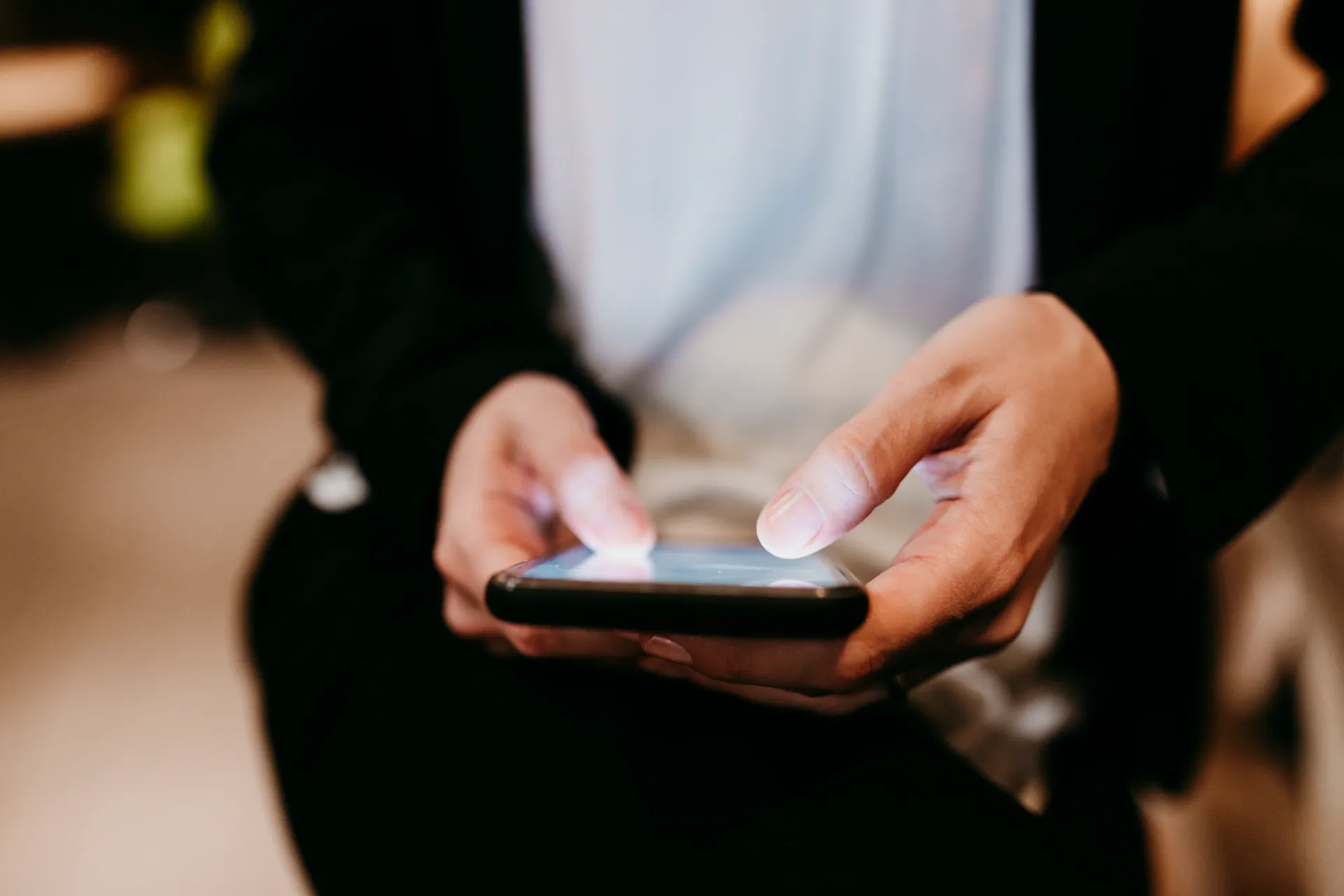 close up view of unrecognizable woman using mobile utc