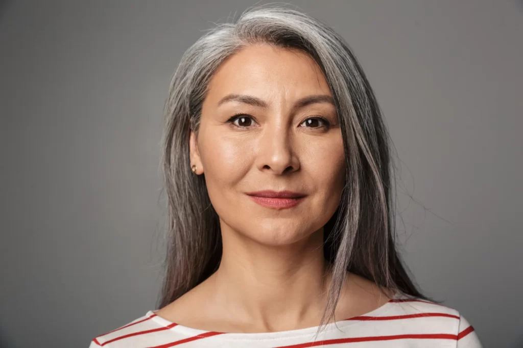 image of adult mature woman with long white hair l utc