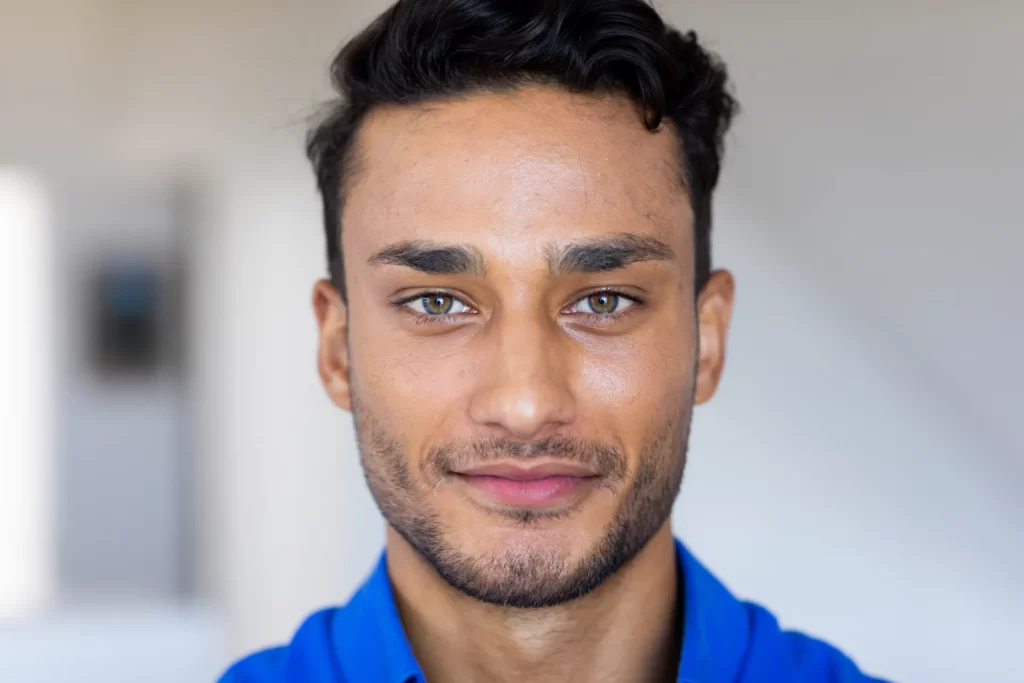 portrait of happy biracial man looking at camera a utc
